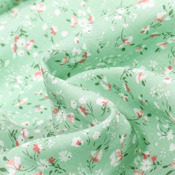 Tissu Viscose Mili Sur Fond Vert Menthe Par 10 Cm