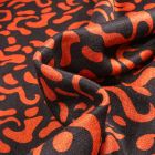 Tissu Maille polyviscose Anna Motifs abstraits orange sur fond Noir