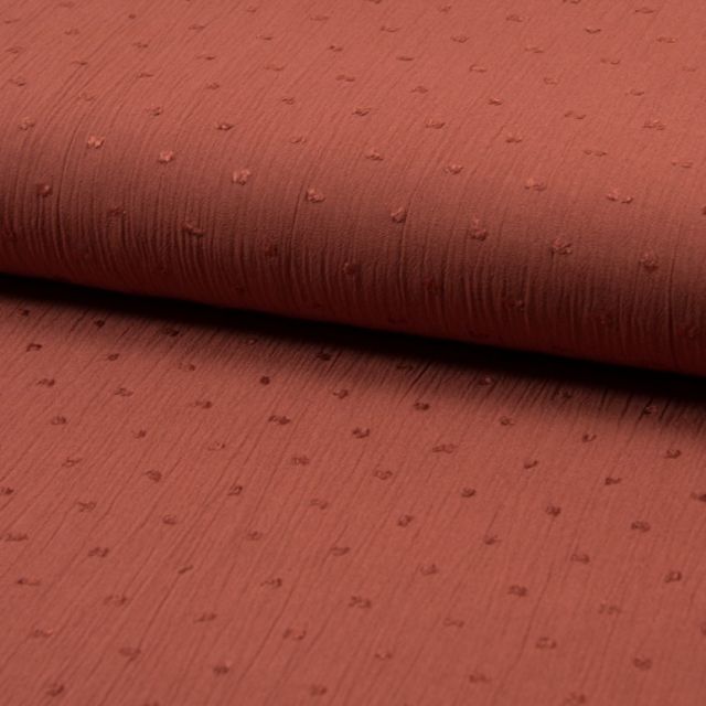 Tissu Viscose Plumetis sur fond Rose pâle