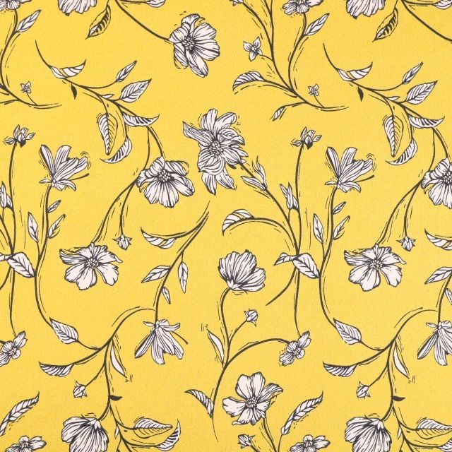 Tissu Crêpe Deluxe Fleurs Noires et blanches sur fond Jaune or - Par 10 cm