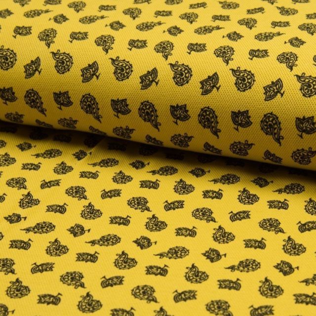 Tissu Jersey Piqué de coton spécial Polo Kashmir Noir sur fond Jaune - Par 10 cm