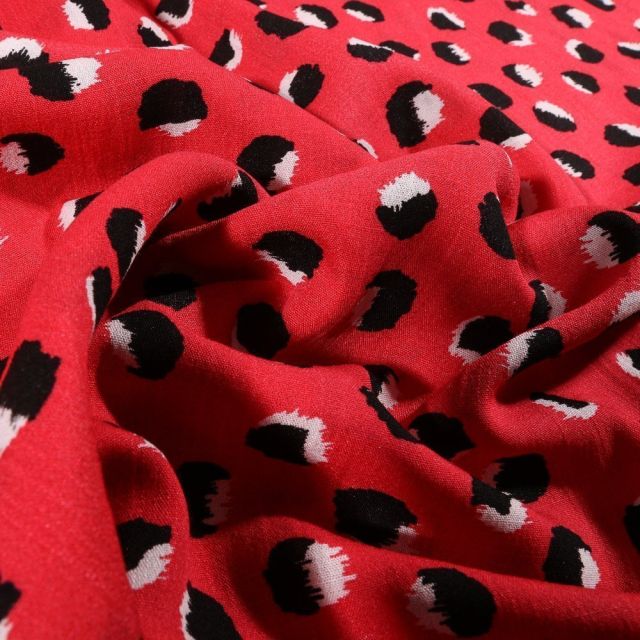 Tissu Viscose texturé Pois déstructuré noir et blanc sur fond Rouge griotte - Par 10 cm