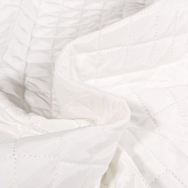 Tissu Doudoune matelassé Dahli sur fond Blanc