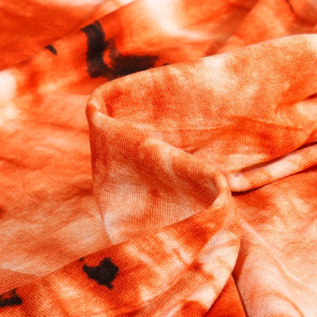 Tissu Jersey Viscose  Tye and dye Dorina sur fond Orange