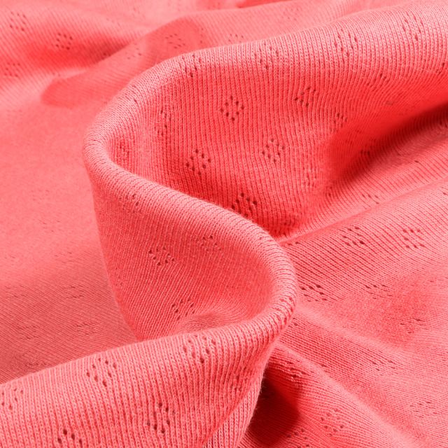 Tissu Jersey Coton ajouré Losanges Corail