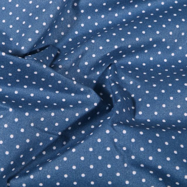 Tissu Coton enduit Petits pois blancs sur fond Bleu denim - Par 10 cm
