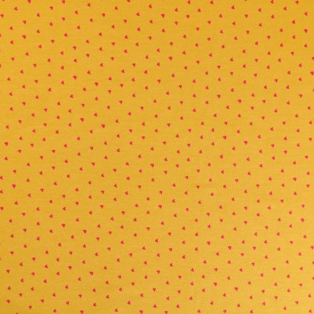 Tissu Jersey Coton Coeurs Fushia sur fond Moutarde - Par 10 cm