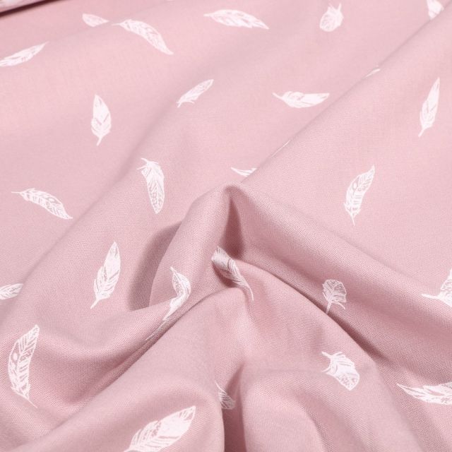 Tissu Coton imprimé Petites plumes sur fond Rose pâle - Par 10 cm