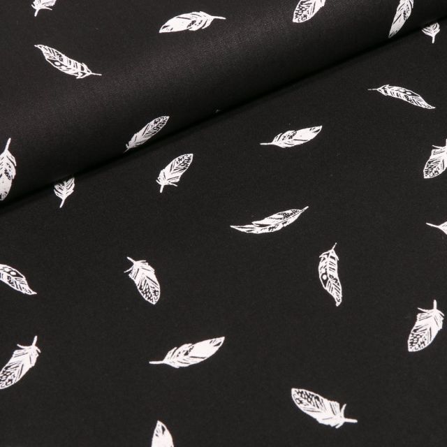 Tissu Coton imprimé Plumes blanches sur fond Noir - Par 10 cm