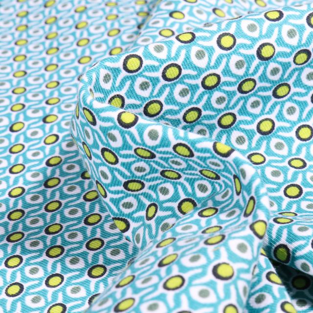Tissu Jersey Coton Bio Alvéoles et pois sur fond Bleu turquoise