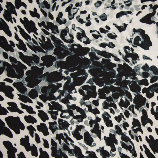 Tissu Jersey Scuba aspect crêpe Léopard Noir et écru sur fond Gris - Par 10 cm