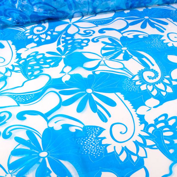 Tissu Imperméable Fleurs bleues sur fond Transparent - Par 10 cm